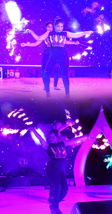 Stunning female fire dance performance at night event in Chennai, India – elegant fire act by ThrillVeera Entertainment