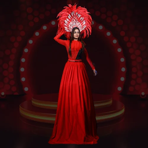 Female Stilt Walker Act Show by ThrillVeera Entertainment featuring a graceful performer in vibrant costume at a festive event or parade