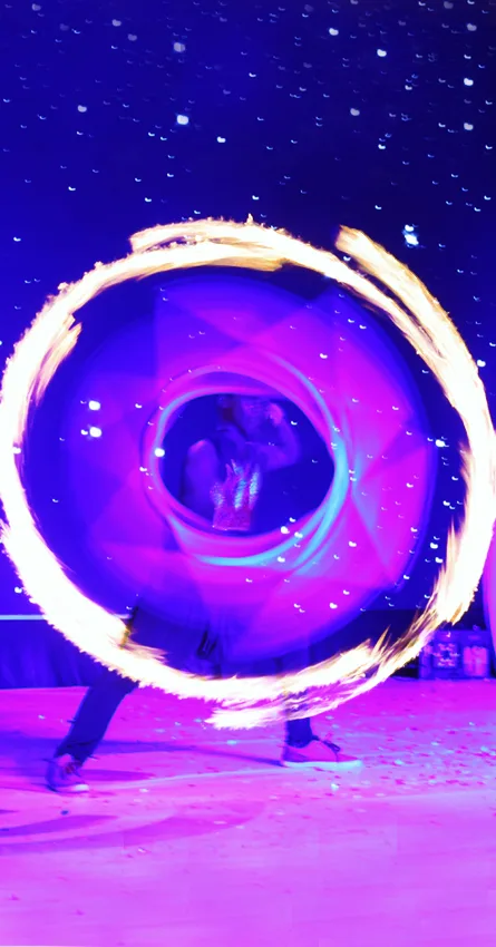 Thrilling fire show performance at an outdoor event in Chennai, India – professional fire act by ThrillVeera Entertainment