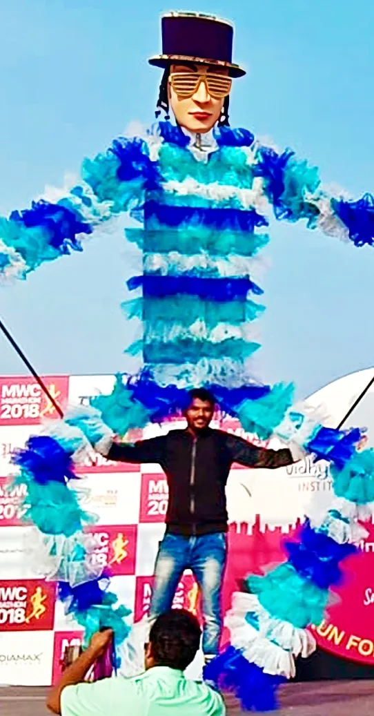 Tall Walkers Act performing at a public event – interactive tall walker with dance performance entertainment by ThrillVeera Entertainment