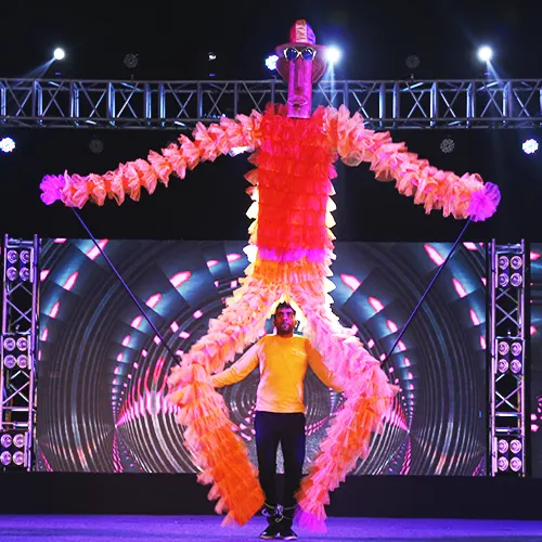 Live performance featuring juggling, fire tricks, and unicycle skills by Thrillveera Entertainment.